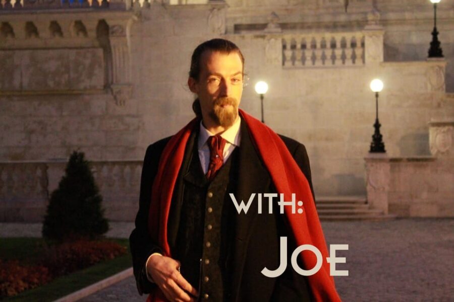 BloodThirsty Hungary: Walking tour & Dark Historical Stories - Castle District at night, with a performer as your guide
