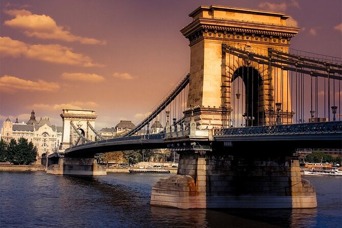 Budapest Danube 1 Hour Sunset or Night Cruise with Audio Guide - Liberty Bridge and Hotel Gellért: Spot the Thermal Bath Story