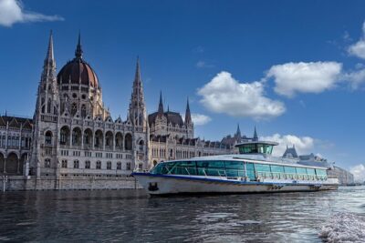 Budapest Danube Cruise with Drink, Audio Guide, Margaret Island - The boat experience: glass, open air, and room to breathe