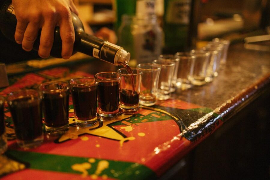 Budapest: Guided Bar Crawl Walking Tour - Füge Udvar finish: where the night often turns into karaoke energy