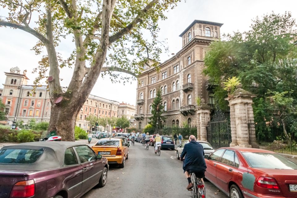 Budapest: Guided City Discovery Bike Tour - Szechenyi Thermal Bath and Zoo area: famous names, real street-level views