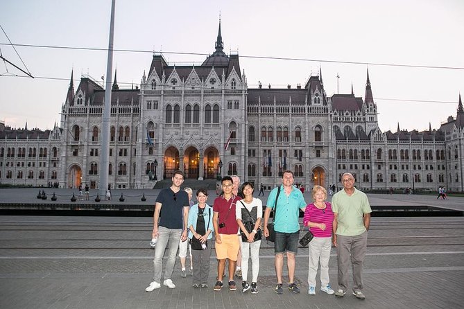 Budapest: Night Walking Tour with Danube River Cruise - Vigadó Concert Hall and the 1-hour Danube cruise with your included drink
