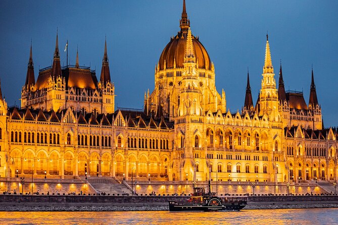 Budapest Paddle Steamer Danube Cruise with Tokaj & Audio Guide - Onboard comfort: heated seating, blankets, umbrellas, and a real welcome drink
